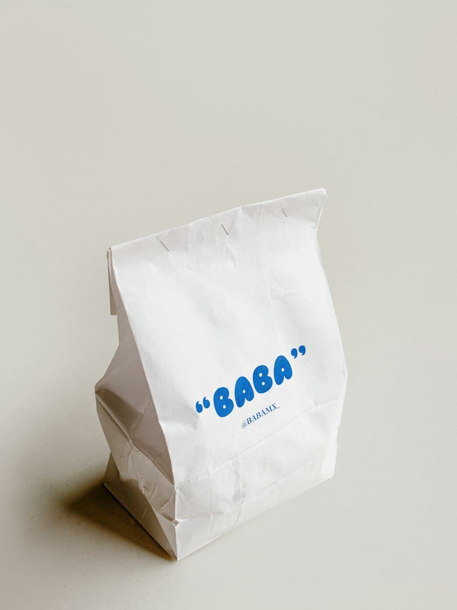 Branded product packaging on a light background